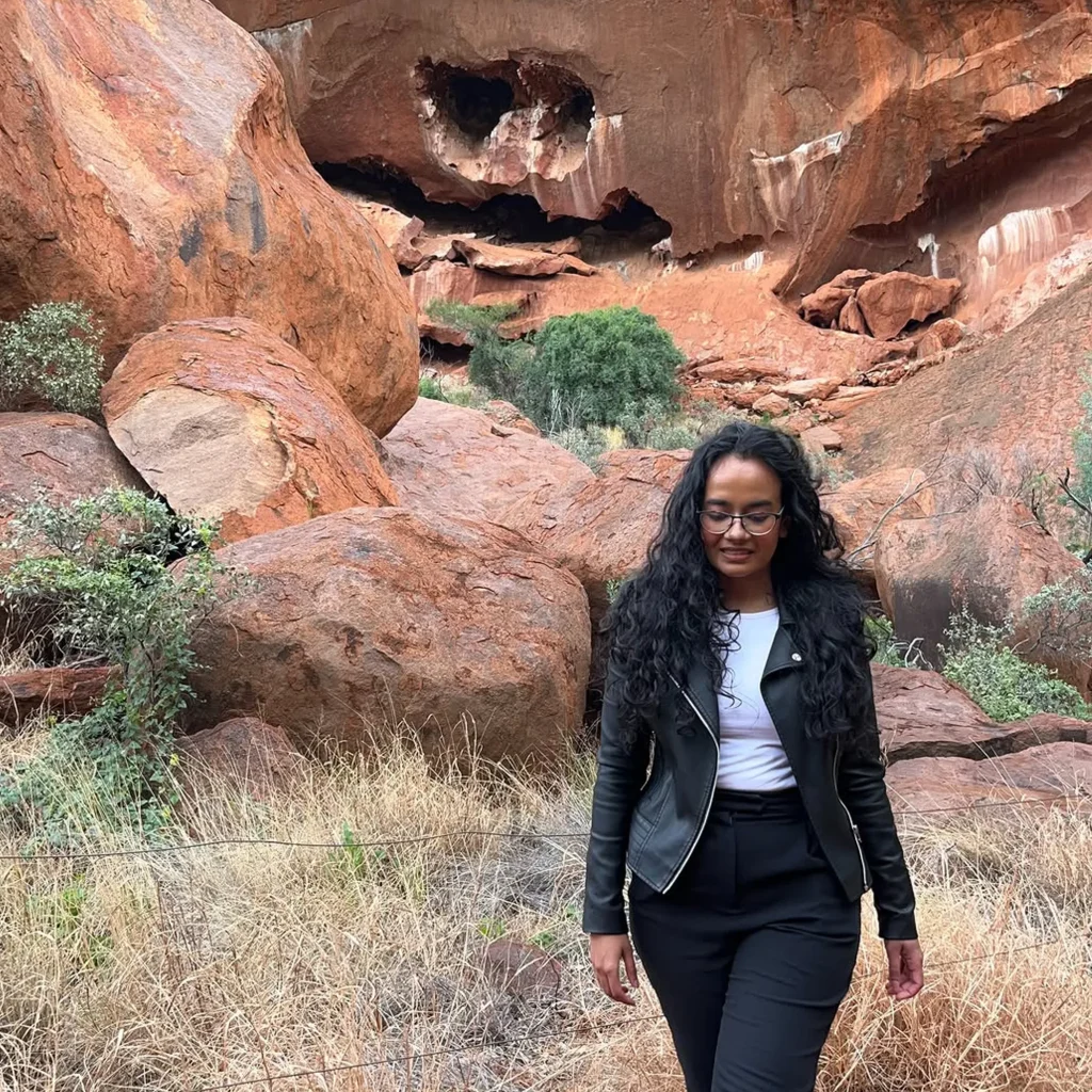 visitor exploring uluru surroundings