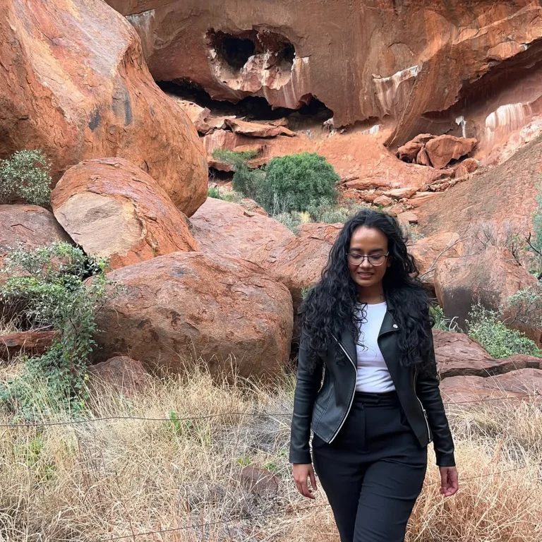visitor exploring uluru surroundings