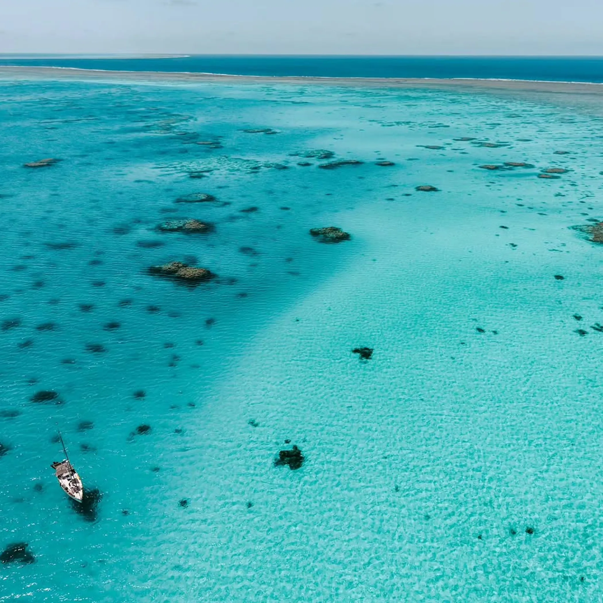 reef photograph with boat